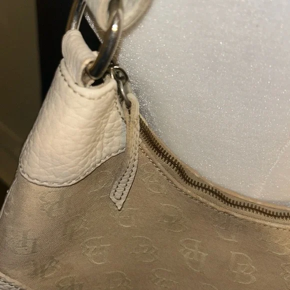Dooney and Bourke vintage hobo purse in the color cream. - Picture 3 of 14